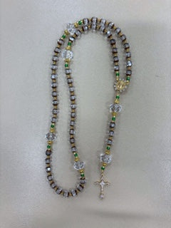 Rosary with crystal, gold, green beads.